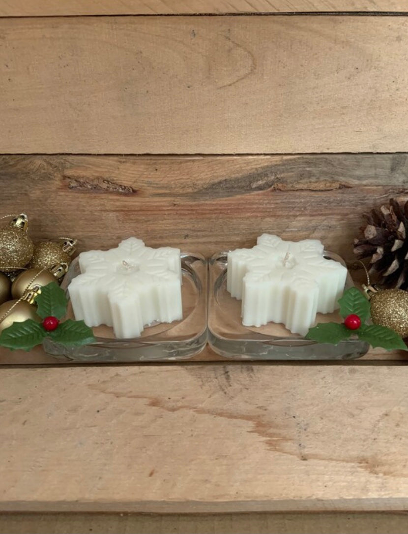 2 Snowflake Christmas Scented Vegan Candles with Holly Decoration on a Glass Coaster